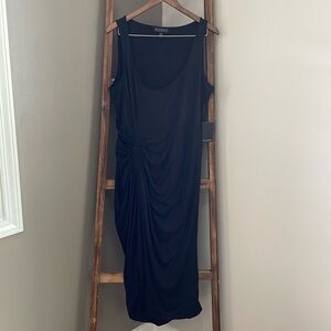 Eloquii woman’s black dress w/lower side ruching in front.